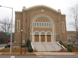 Temple Beth-El Birmingham Alabama. Brown tinted brick building with wide, stone stairway at entrance.