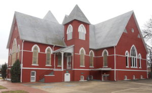 First Baptist Church Selma, Alabama. Brick church with long roof line.